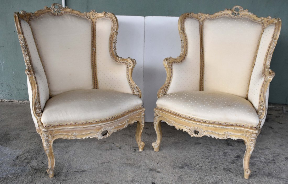 PAIR OF FRENCH LOUIS XV STYLE UPHOLSTERED BERGERES: Some staining to upholstery. 40 in. high. 28 in. wide.