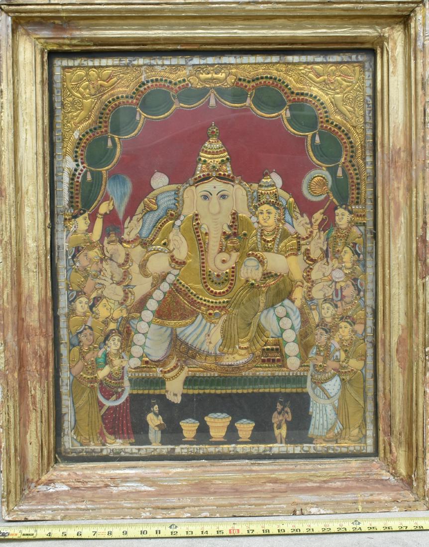 SOUTH INDIA, TANJORE SCHOOL, (18th-20th Century): Ganesh with Attendants. Gilt, Foil, Tempera, Semi-Precious Minerals, Sand, on a wood base and frame. Measuring 29 by 23 in., overall 36 by 29 in. (Cond: glass covered, some wear, minor loss, overall g