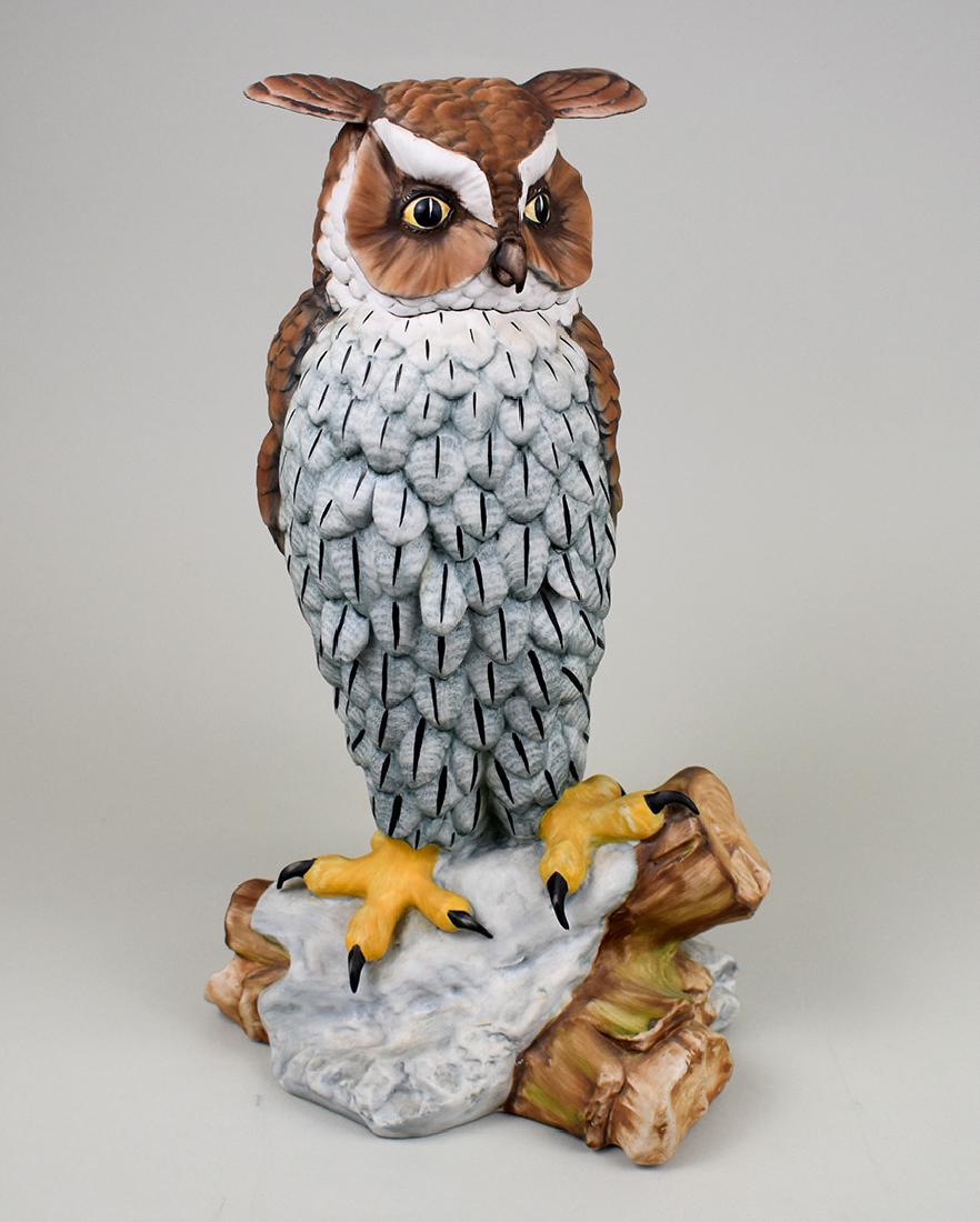CAPODIMONTE PORCELAIN GREAT HORNED OWL: 20th Century. Variously marked. With allover brown and white feather modeling and a mat glaze. Height 14.50 in. Width 9 in. (Cond: good)