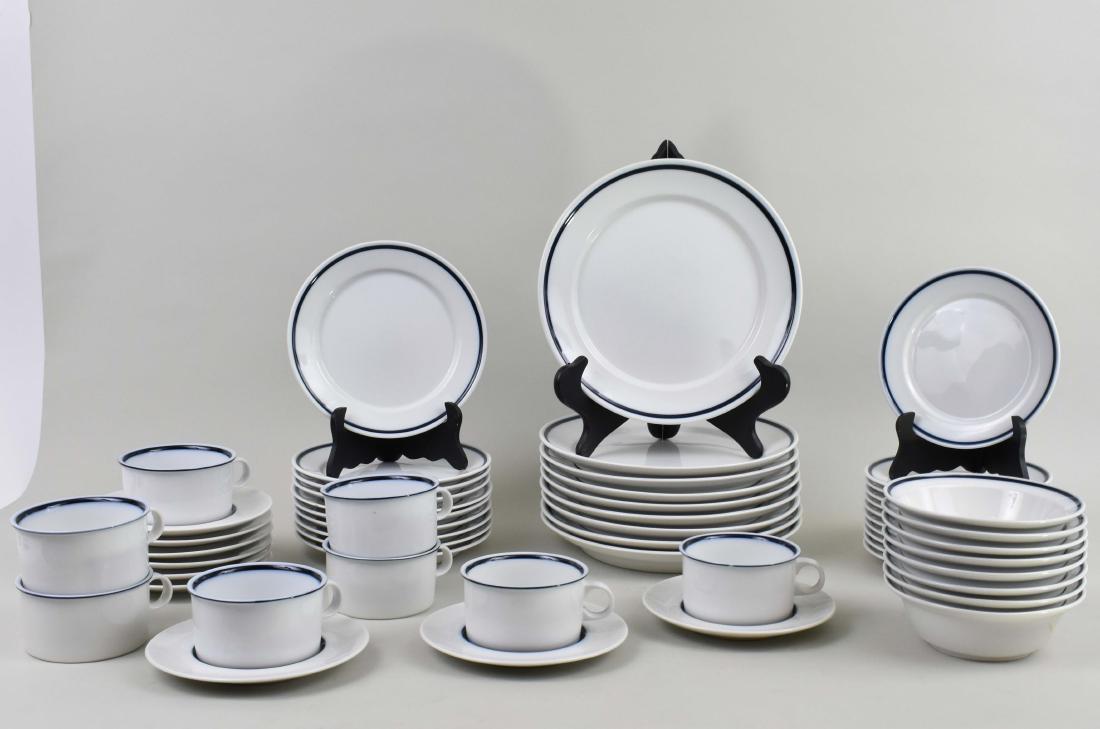 ROYAL COPENHAGAN PORCELAIN PART DINNER SERVICE: Modern. The undersides marked. White with a cobalt blue ring. ( Cond: two plates with chips)