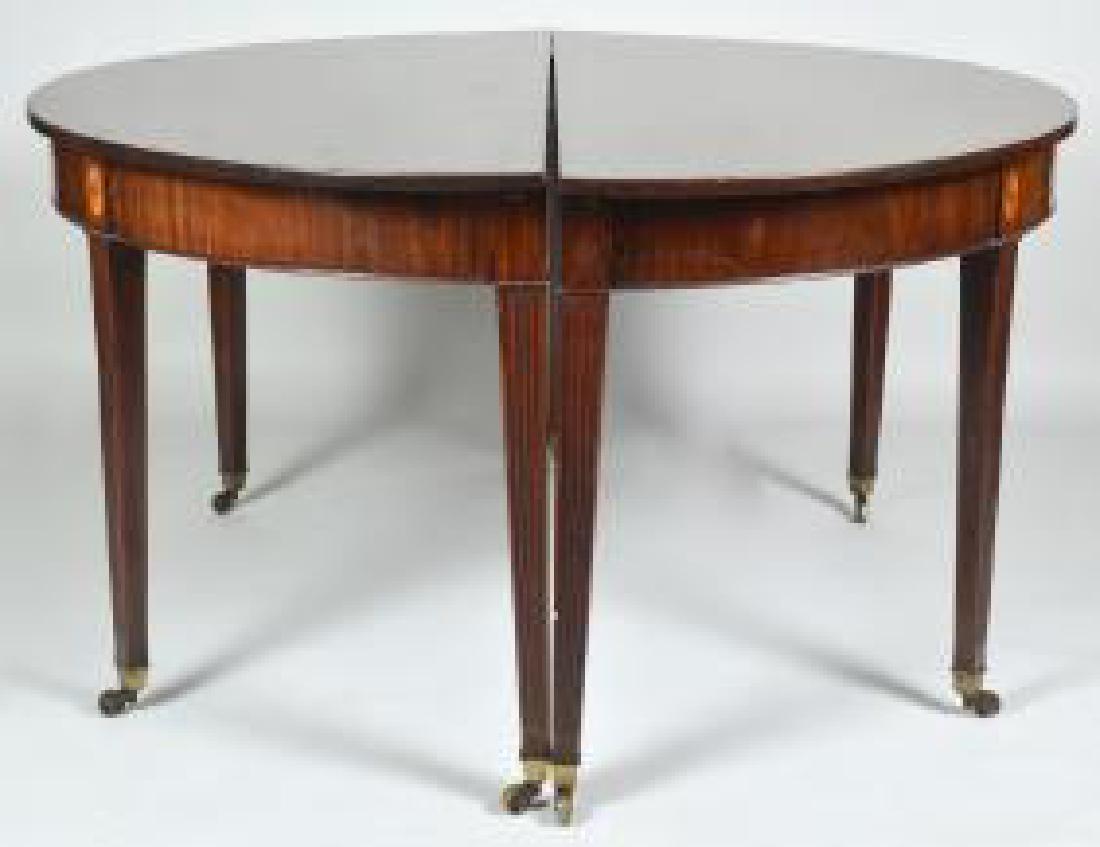 GEORGE III MAHOGANY D-SHAPED GATE-LEG DINING TABLE: Circa 1800. On square tapering fluted legs, with three leaves. Height 30 in. Width 54 in. Depth of each end 30 in. (Cond: good, nice color, some repairs)