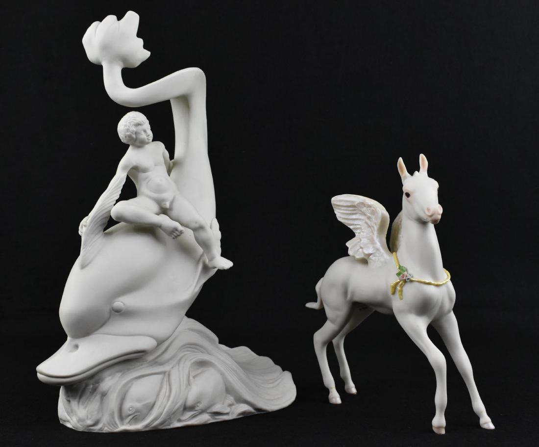 BOEHM BISQUE PORCELAIN CLASSICAL FIGURAL GROUP: The Pompeian and Herculaneum Series, limited ed., number 10. Depicting a boy riding a dolphin amidst waves. Together with a Cybis Porcelain Figure of a young winged Pegasus. Height 14 in., 8.5 in., re
