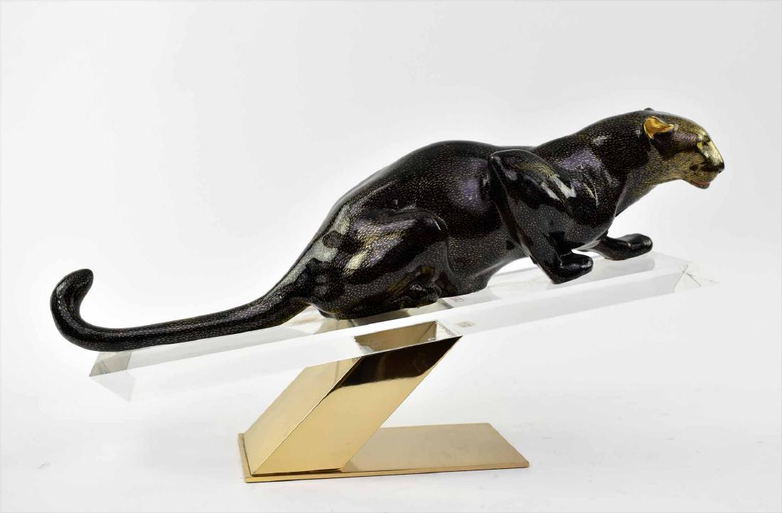 CONTEMPORARY MANGANI FOR OGGETTI GLASS PANTHER: Italian. Labeled. The gold panther poised to attack, resting on a brass and Lucite base. Length 9.5 in. Width 17.5 in. (Cond: good)