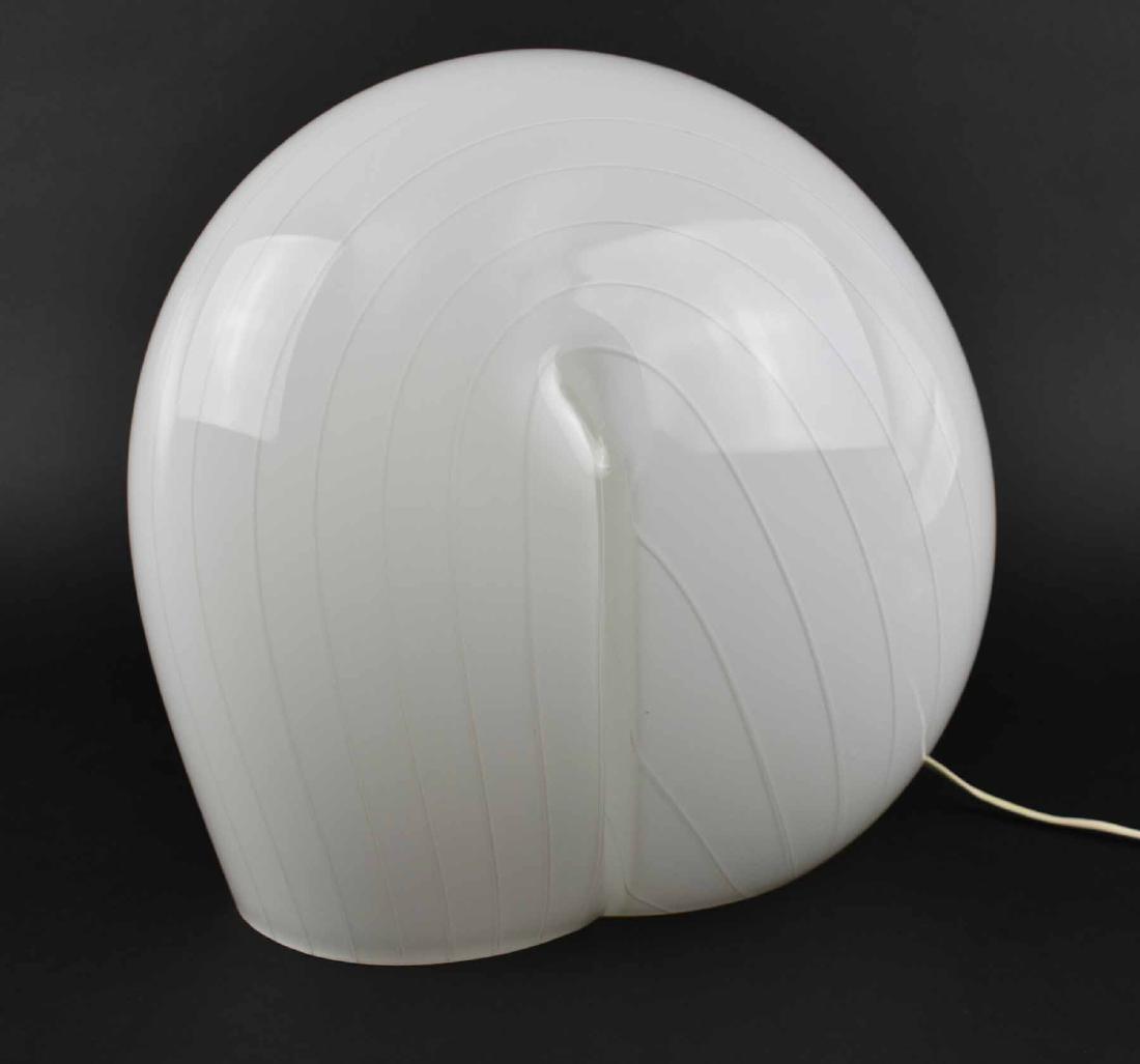 VETRI MURANO WHITE GLASS LAMP: Italian, Vitri Murano label. Of asymmetrical nautilus form with subtle striations. Height 12.5 in. Width 13 in. Depth 9 in. (Cond: good)