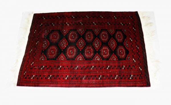 Bokhara Carpet. 91" l x 56 1/2" w. In very good c