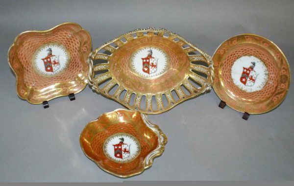 EIGHT PIECE CHAMBERLEIN'S WORCESTER PORCELAIN PAR: EIGHT PIECE CHAMBERLEIN'S WORCHESTER PORCELAIN PART DESSERT SERVICE.English C. 1845. Comprising; 2 square dishes, leaf shaped dish, center bowl and 4 dessert plates. Each centered by a coat of arms.Co