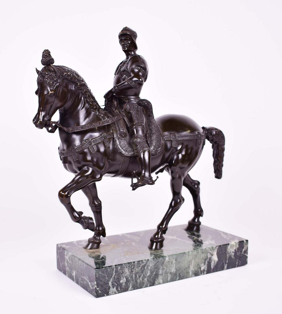 CONTINENTAL PATINATED BRONZE OF NOBLEMAN ON HORSEBACK: 19th/20th Century. Unmarked. Seated upon a horse draped in parade trappings, the nobleman dressed in ceremonial Renaissance armor, on a verde antico marble base. Height overall 15 in. Width 13 in. Dep