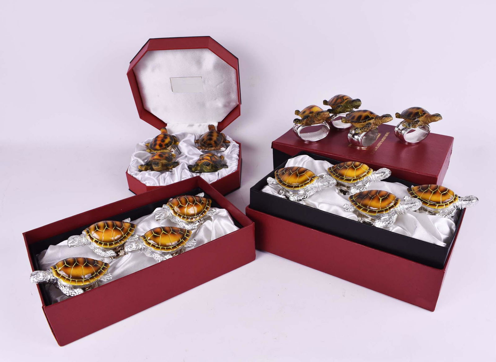 HANS TURNWULD/TURREVALY TURTLE FORM NAPKIN RINGS: Each marked, in their original boxes. Silvered metal and enameled composition, slight differences between some. (Cond: good)