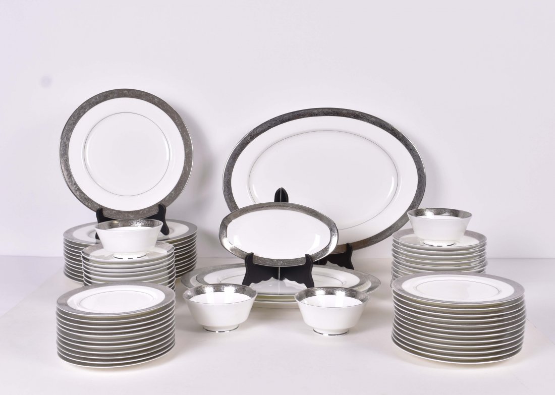 MIKASA NINTY-PIECE PORCELAIN PART DINNER SERVICE: Marked on the underside. In the Edinburgh pattern. Each piece with multiple etched silver banded borders. Comprising: 12 dinner plates, 11 dessert plates, 12 bread plates, 12 fruit bowls with 12 under