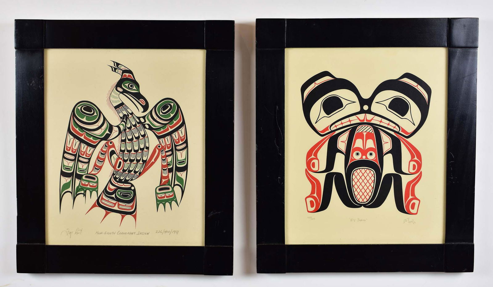 TONY HUNT, JR. (Canadian. 1962-2017) LITHOGRAPHS: Big Bears and Kwa-Giulth Cormorant Design, 1982, 1981. One signed, both titled, numbered 188/400 and 226/400, respectively. Pair of Lithographs in Color. Site measuring 13.5 by 11 in., in ebonized fra