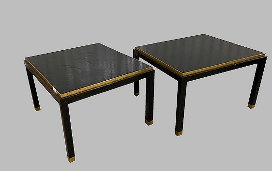 SUITE OF CONTEMPORARY BRASS-MOUNTED EBONIZED TABLES: Comprising a pair of end tables and a cocktail table. Each inset with a black leather top, with a raised brass border, and brass cuff affixed to leg. End tables measuring 17 in. by 25 in. by 29 in. Co