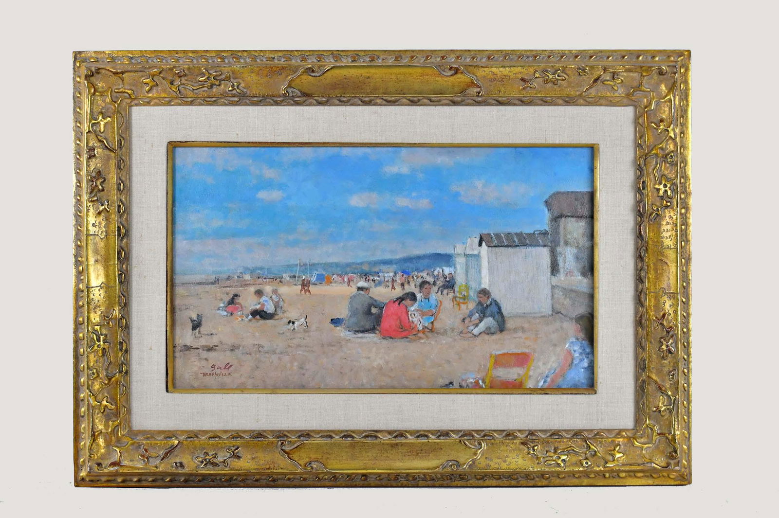 FRANCOIS GALL (French. 1912-1987) PAINTING: Trouville, Figures on the Beach. Signed F. Gall, Trouville l/l. Oil on Canvas. Measuring 11 by 18 in., overall in a gilt wood frame 18 in. by 26 in.