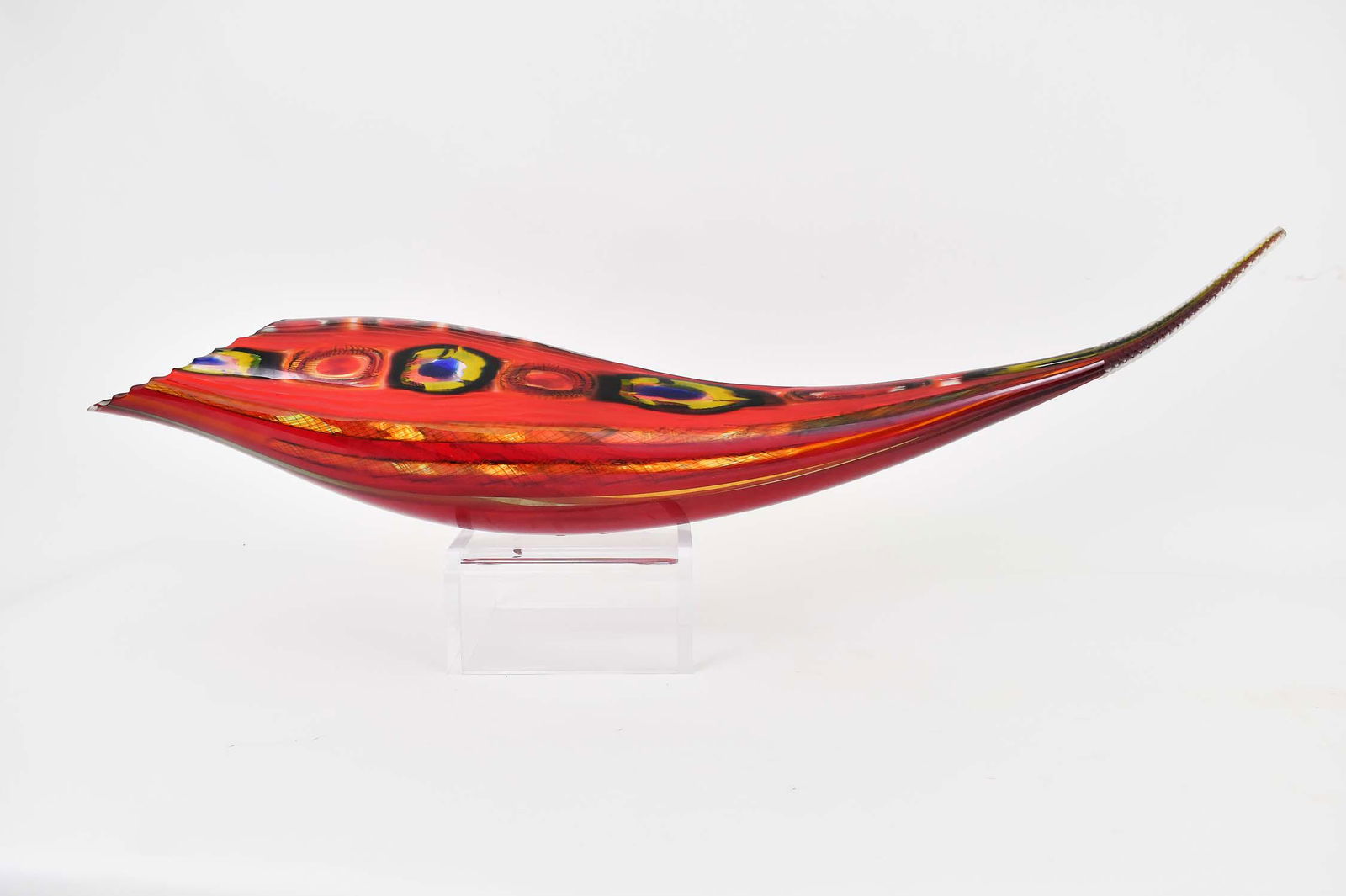 AFRO CELOTTO (Italian. b. 1963) VENETIAN GLASS: Lodato, 2007. Signed. Cane decorated red-glass fish-form vessel, on stand. Length 39 in. (Cond: good) Provenance: William Zimmer Gallery, Mendocino, CA