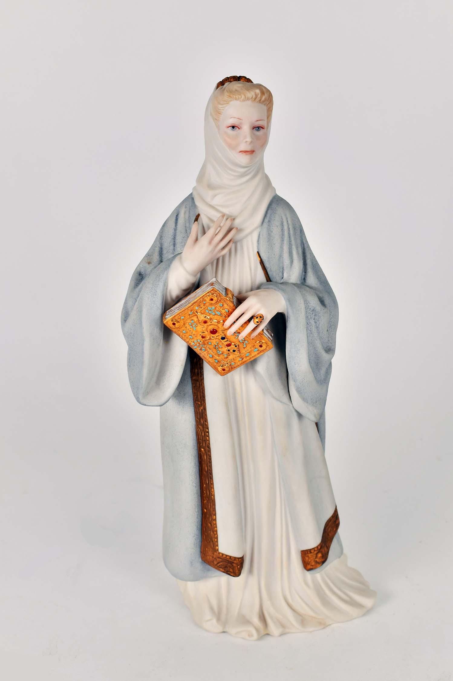 CYBIS PORCELAIN FIGURE OF KATHERN HEPBURN: Marked Cybis, # 464. Depicted as Eleanor of Aquitaine, the wife of King Henry II, in the Classic film, The Lion in Winter. Height 14 in. (Cond: good)