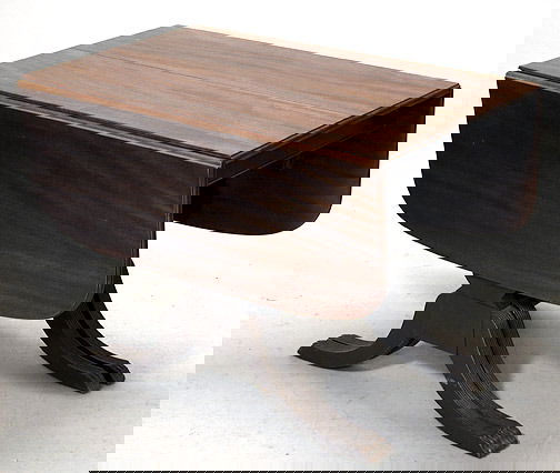 Mahogany Phyfe Style Drop-Leaf Dining Table: Mahogany Phyfe Style Drop-leaf Dining Table with Three Leaves. Good Condition. Measures 30 Inches Tall 56 Inches Long and 42 Inches Wide. 19th Century Bronze and Marble Figural Joan of Arc Mantle Cloc