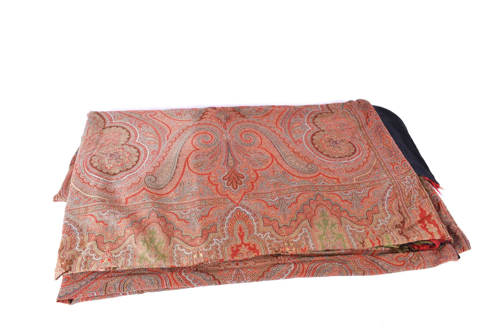 ANTIQUE PAISLEY PIANO SHAWL: Of traditional design and color, with a red frayed fringe, on a black linen backing. Measuring 130 in. by 60 in. (Cond: good)