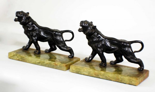 PAIR OF PATINATED WHITE METAL BOOKENDS