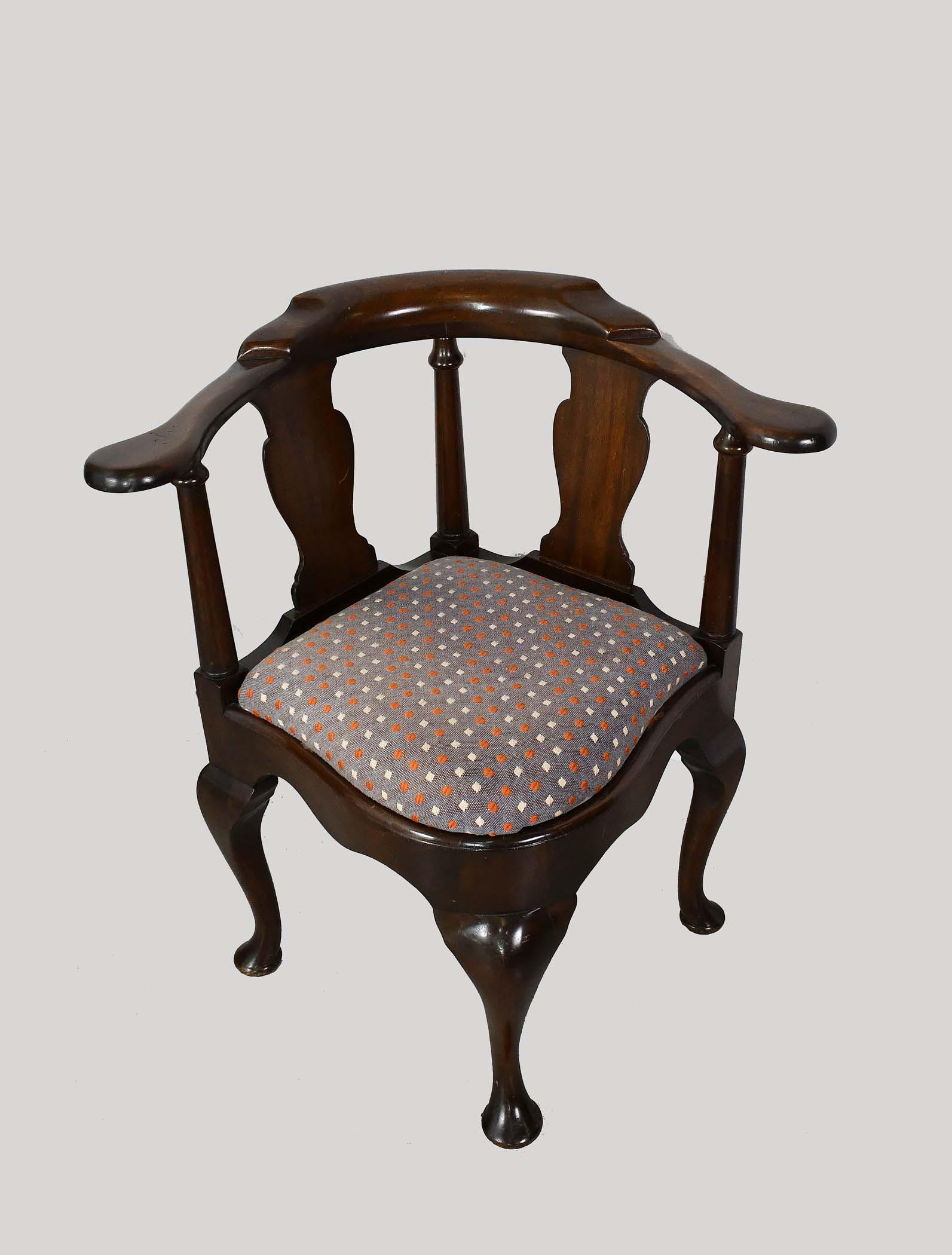 GEORGE III STYLE MAHOGANY CORNER ARMCHAIR: The curved back above solid splats, with a drop-in seat, on cabriole and turned legs. (Cond: good, nice dark coloring)