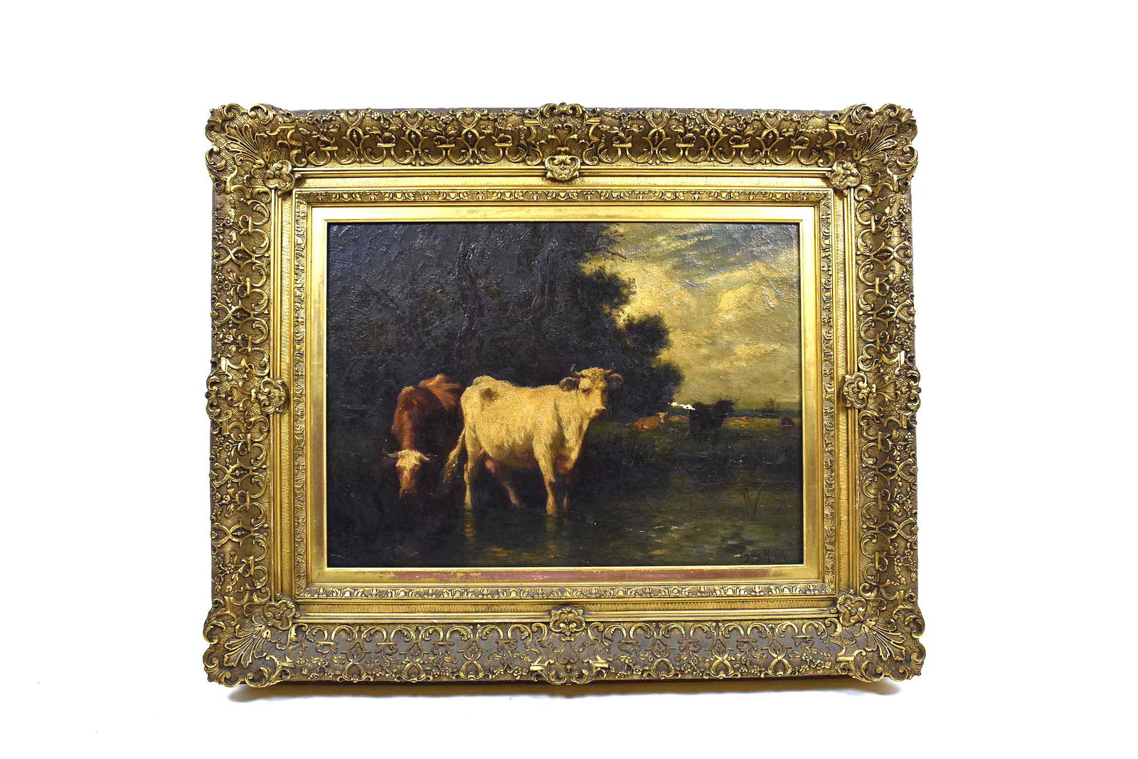 EMILE VAN MARKE (Belgian. 1827-1890) PAINTING: Grazing Cows. Signed lower right. Measuring 17.75 x 24 in. In a period gesso cast and carved gilded exhibition frame. Overall measures 28 x 34.50 in. Frame in good condition. (Cond: canvas has overall
