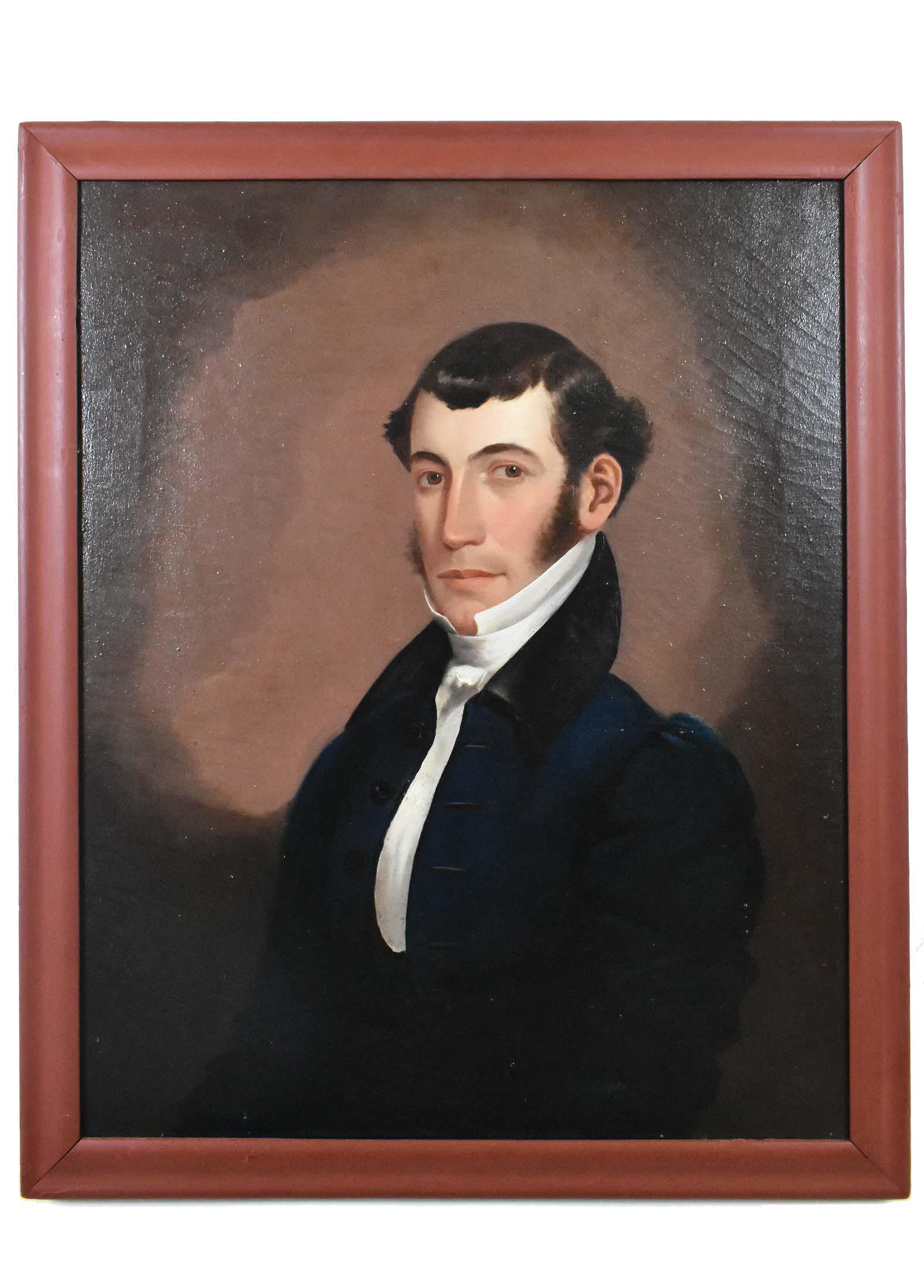 AMERICAN SCHOOL PORTRAIT OF A MAN CIRCA 1825: Half Length Seated Portrait of Young Man in Blue Coat. Unsigned. Oil on Canvas. Verso bears paper tag identifying the sitter as George Burroughs from Western Mass. now Warren, Mass. 30 x 24 inches. Ha