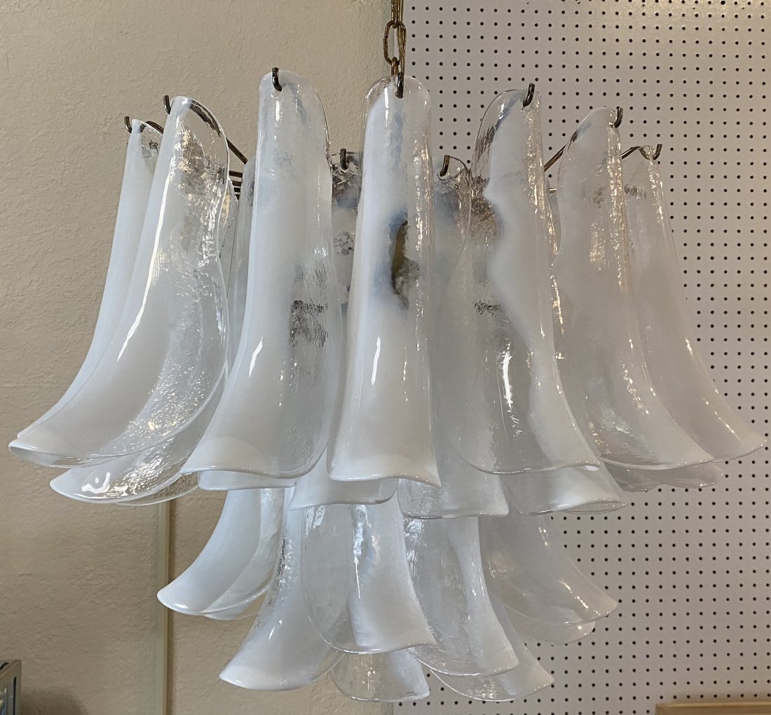 CONTEMPORARY ITALIAN GLASS CHANDELIER: Composed of multiple removeable colorless and white folded glass pendant Calla Lily-form panels. Height 17 in. Diameter 23 in. (Cond: good)