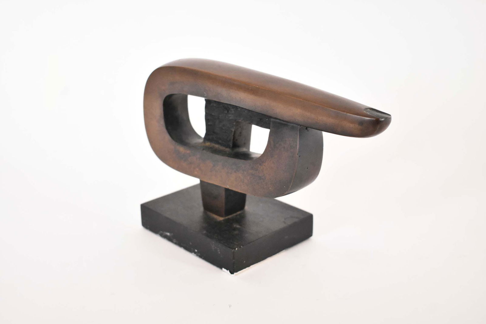 JOHN FARNHAM (British. b. 1942) Sculpture: Untitled. Signed, numbered 3/7 on a wood base. Patinated Bronze. Height 5 in. Width 5.75 in. Height overall 8.75 in.