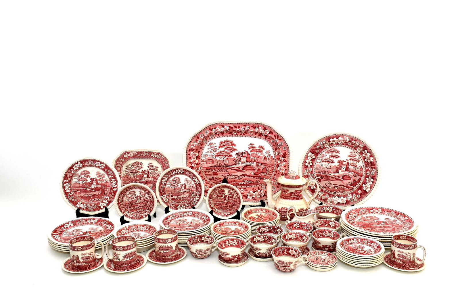 STAFFORDSHIRE 83 PIECE EARTHENWARE DINNER SERVICE: Late 19th/Early 20th Century. Associated elements, marked either Spode, Pink Tower, or Copeland Spode, Tower. Transfer printed with a tower bridge in an extensive landscape. Comprising: 7 dinner plate
