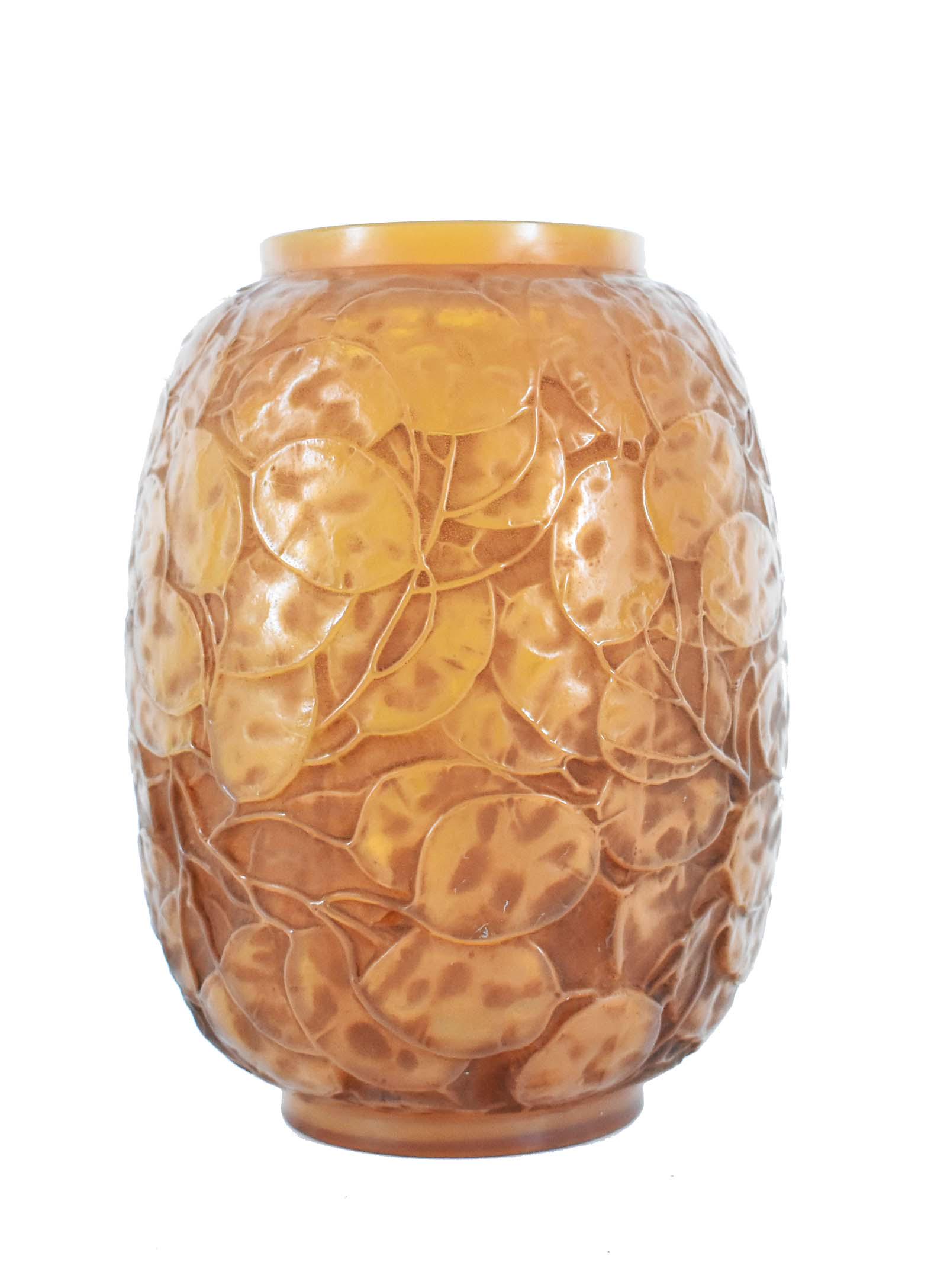 LALIQUE SEPIA OPALINE MONNAIE DE PAPE GLASS VASE: Designed 1914, molded signature R Lalique. Marcilhac 416, no. 897. The elongated ovoid vessel with allover molded Monnaie de Pape foliage. Height 9 in. (Cond: drilled, with chips around the interior h