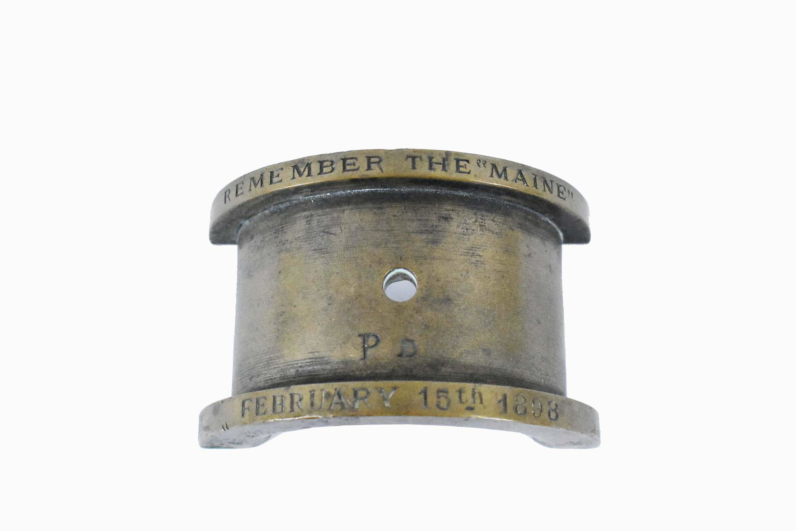 SOUVENIER FROM THE SHIP THE MAINE: The arched ships element inscribed REMEMBER THE MAINE/FEBRUARY 15TH 1898. Height 1.75 in. Width 3 in.