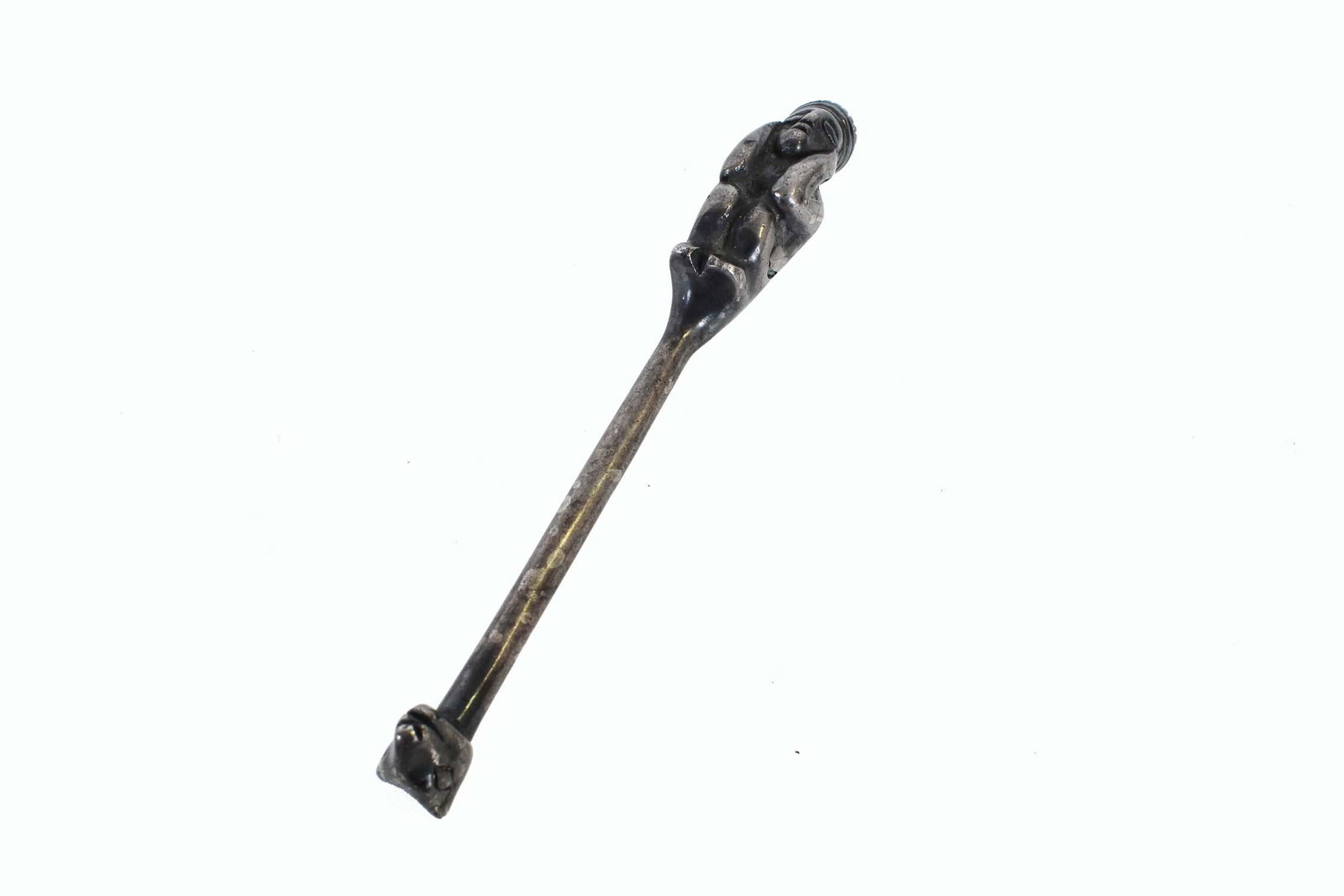 INCA SILVER FIGURE OF A KING OR DEITY: Unmarked. The silver shaft with a crouching man wearing a crown at one end, a Llamaâ€™s head at the other. Length 5.25 in. 3.7 troy oz. (Cond: wear to both ends). Provenance: Formerly The Collect