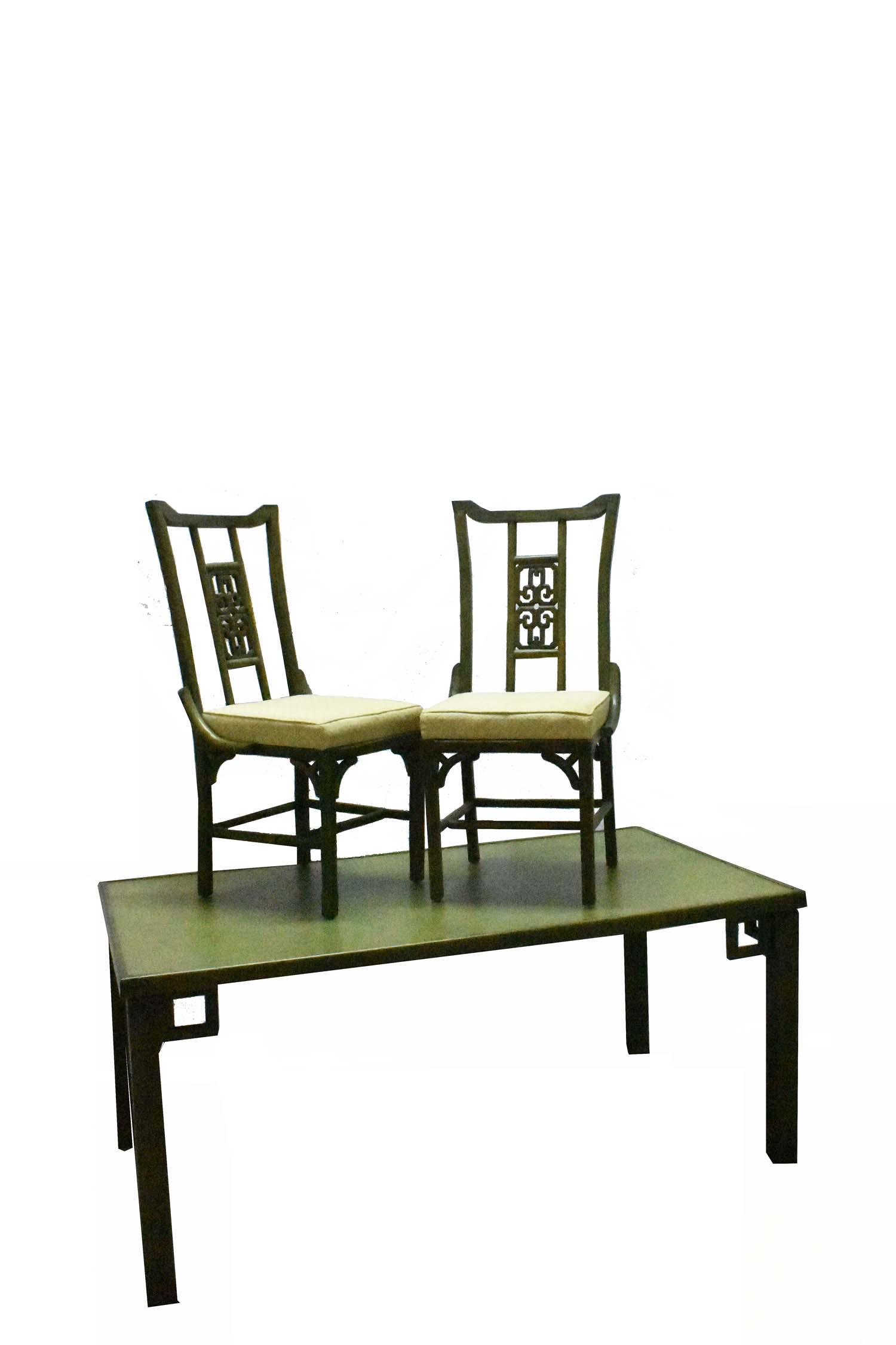 VINTAGE CHINESE DECO PAINTED DINING TABLE & SIX CHAIRS: 1950-1960. In the manner of James Mont. The rectangular table with a leather top, on chamfered straight legs, headed by open brackets, the side chairs with squared open backs, containing a dipped cres