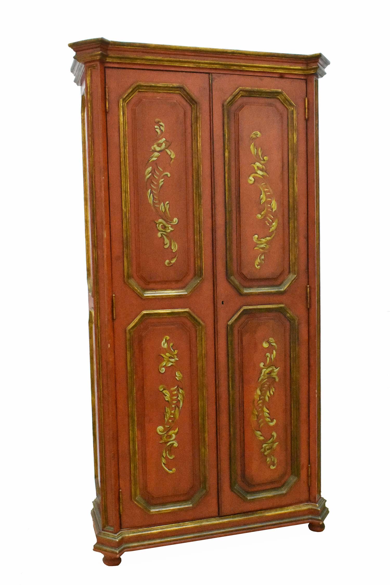 VENETIAN ROCOCO STYLE PARCEL GILT PAINTED CABINET: First Half 20th Century. Rectangular, with a pair of paneled doors opening to a fitted interior, with a shelf and gilt spindles, the corners with canted stiles, decorated with gilt foliage. Height 66 
