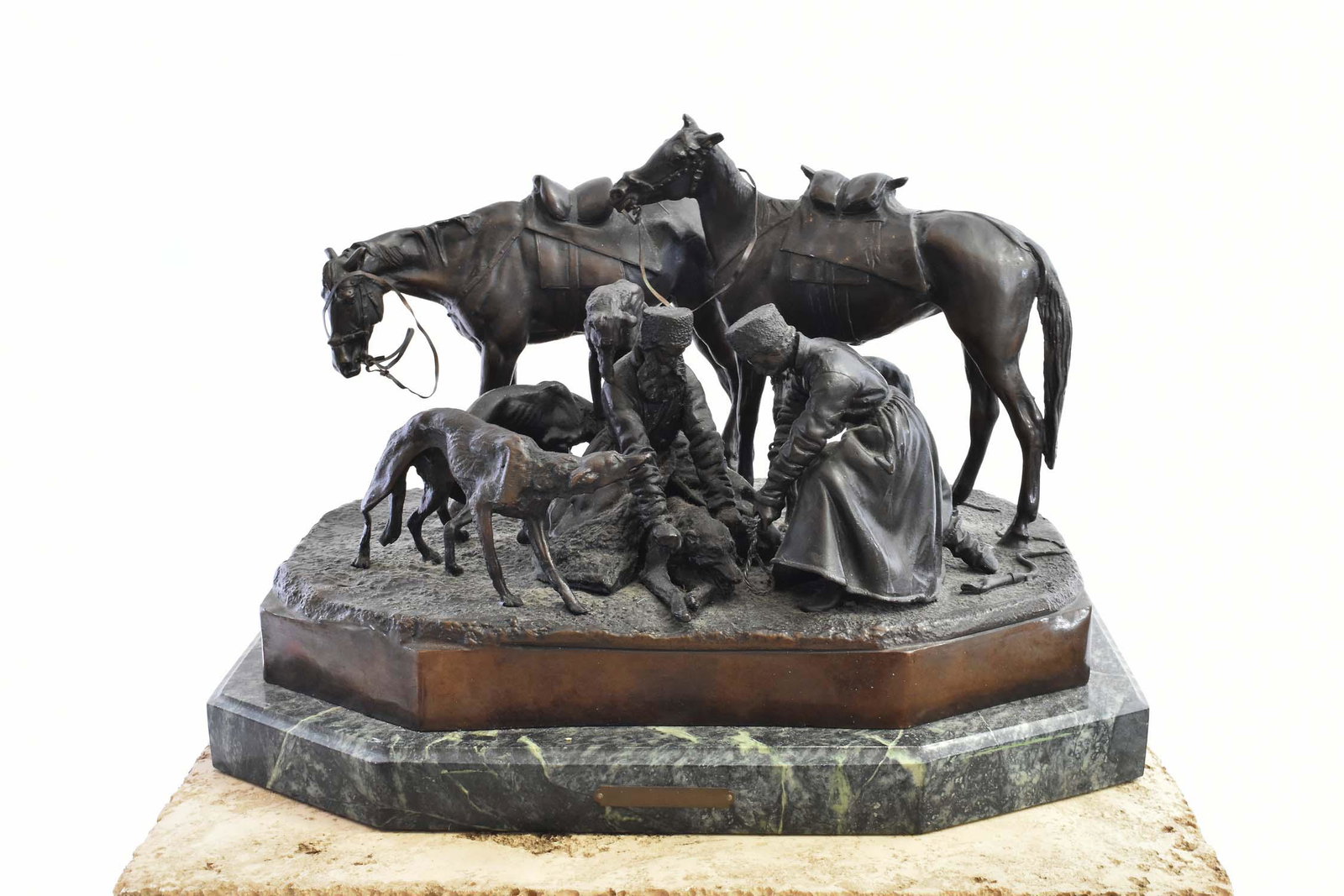 AFTER NIKOLAI LIEBERICH (Russian. 20th Century): The Wolf Hunt. Patinated Bronze, affixed to a verde antico marble base inscribed "Sculp. Lieberich", on front of the marble base, foundry marks left front corner of base C.F. Woerffel Fab. / St Peters