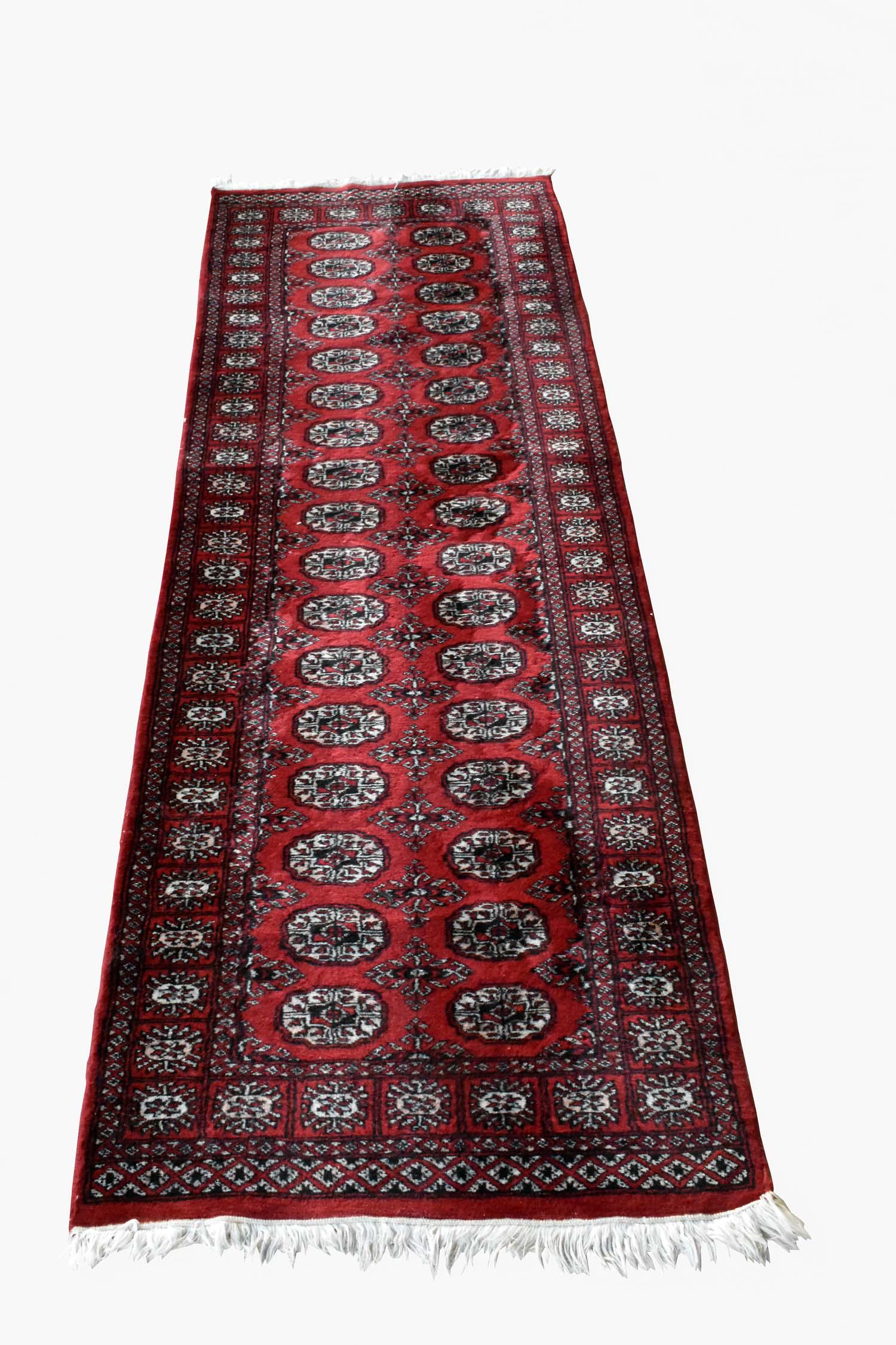 TEKKE RUNNER, PAKISTAN: Measuring 98 by 30 in. Provenance: Property of The Haggstrom Trust, Jupiter, FL