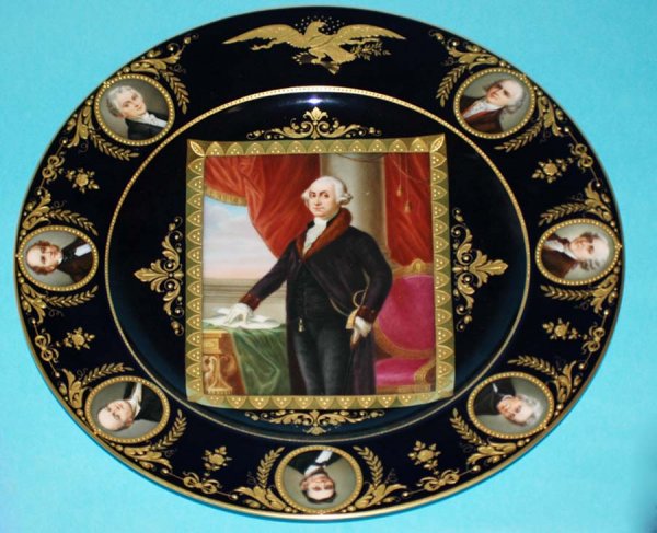 RARE HUTSCHENREUTHER PORC "PRESIDENTIAL" CHARGER: EXTREMELY RARE HUTSCHENREUTHER PORCELAIN "PRESIDENTIAL" CHARGER German. Late 19th Century. Centered by George Washington below a gilt eagle and surrounded by portraits of seven presidents, "James Madi