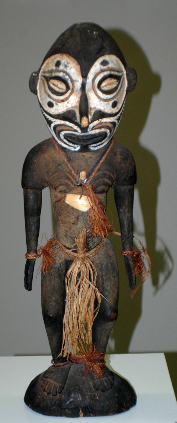 PAPUA NEW GUINEA SEPIK RIVER TRIBAL FIGURE: PAPUA NEW GUINEA SEPIK RIVER TRIBAL FIGURE Wood, shells, red ocher and white pipe clay paint, fibers and raffia. Height 27". (Cond: normal wear with nicks to nose and chest) (600/800)