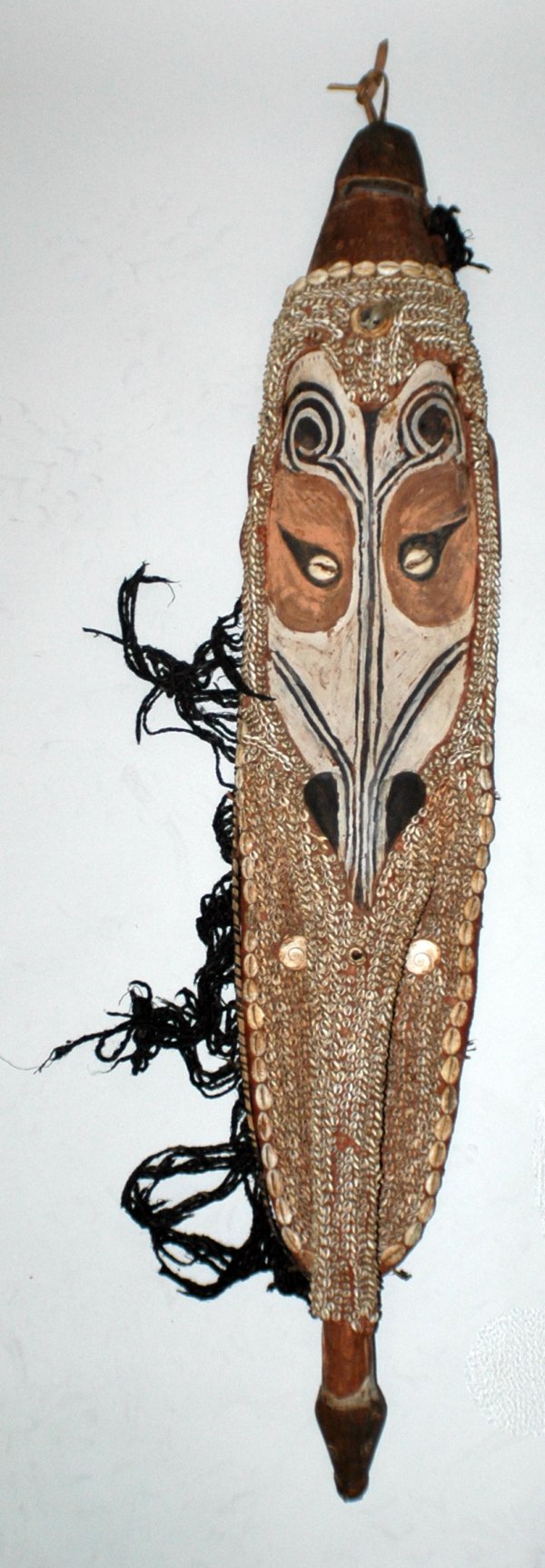 PAPUA NEW GUINEA MEI TRIBAL MASK: PAPUA NEW GUINEA MEI TRIBAL MASK Middle Sepik River, Latmul Tribe. Wood, clay, shells and fibers. Height 37". (Cond: normal wear) (300/500)