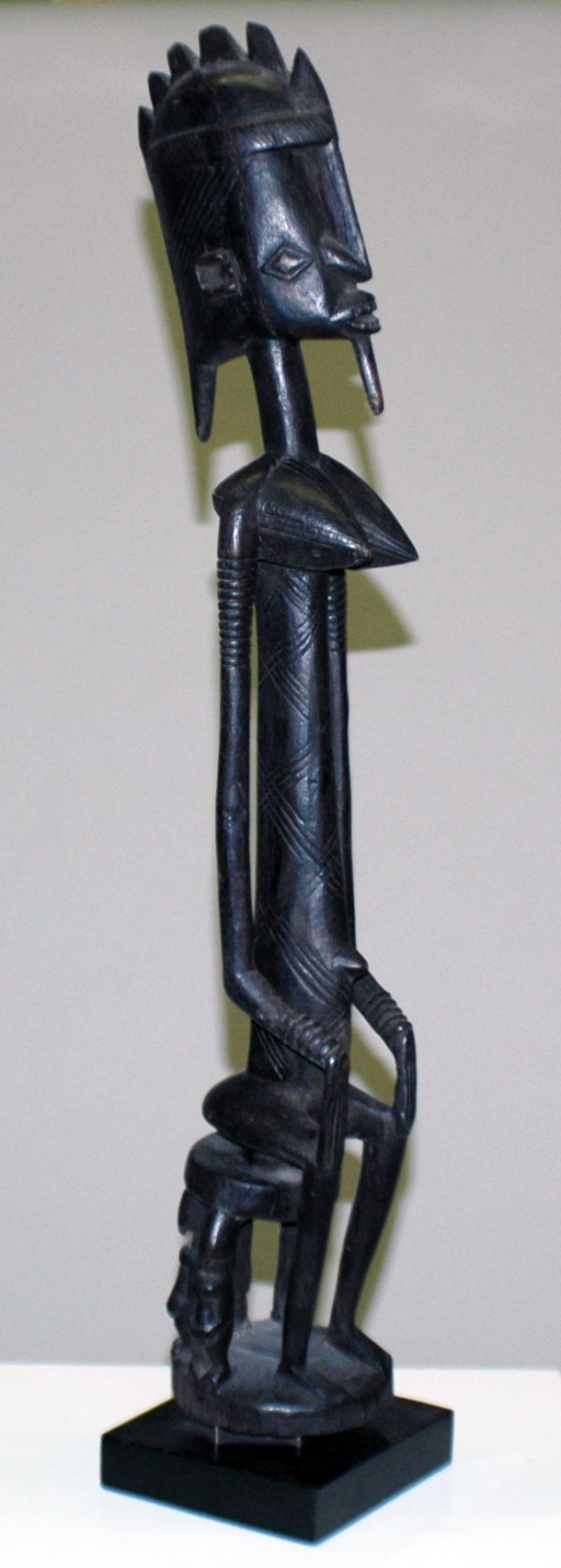 AFRICAN DOGON TRIBAL STATUE: AFRICAN DOGON TRIBAL STATUE Republic of Mali. Wood. Height 30". (Cond: normal wear with some stress cracks) (400/600)