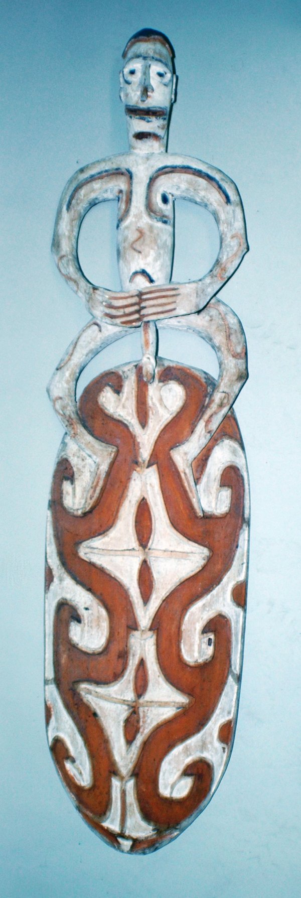 PAPUA NEW GUINEA SEPIK RIVER FIGURAL BOARD: PAPUA NEW GUINEA SEPIK RIVER FIGURAL BOARD Wood, red ochre and white/black pipe clay paint. Height 45". (Cond: normal wear) (150/200)