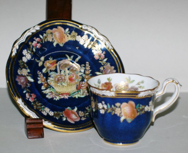 5 COPELAND'S SPODE PORC. DEMITASSE CUPS & SAUCERS: 5 COPELAND'S SPODE PORCELAIN DEMITASSE CUPS & SAUCERS English. Circa 1920. Printed factory mark and Y1912. Each with gilt flowers on a mottled blue ground. Retailed by Tiffany & Co., N.Y. (100/150)