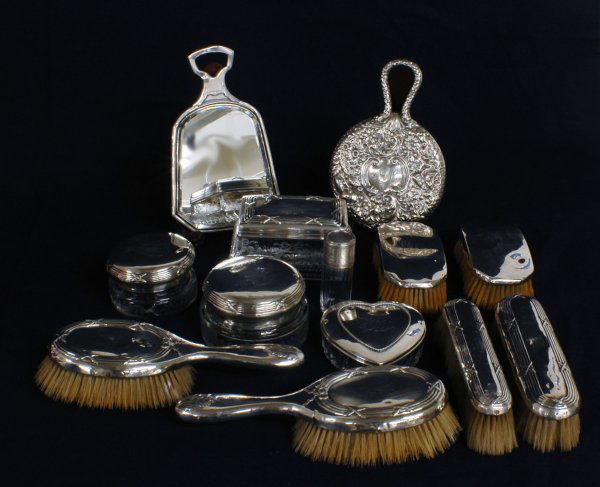 GROUP OF THIRTEEN S/S AND GLASS VANITY ARTICLES: GROUP OF THIRTEEN S/S AND GLASS VANITY ARTICLES American. Comprising: six brushes, five jars and two hand mirrors, ten with A.B.C. monograms, one with BMc monogram. (300/400)