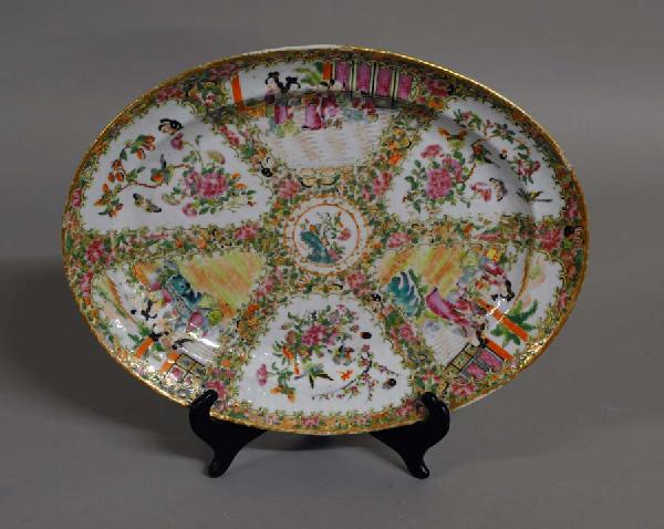 ROSE MEDALLION PORCELAIN PLATTER: Chinese. 19th Century. Of oval form, painted with figural and floral panels. Length 14 1/4". (Cond: minute chips to edge) (300/400)