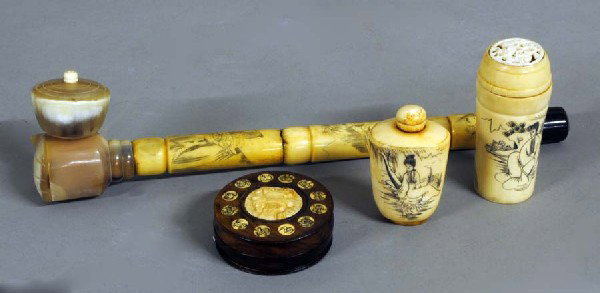 GROUP OF FOUR ETCHED BONE ARTICLES: Comprising: snuff bottle, pipe, compass and a cricket cage. (100/150)