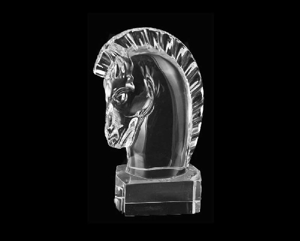 STEUBEN CRYSTAL "HORSE HEAD": American. Signed Steuben. Designed by Sidney Waugh in 1937. Catalog No. 7779. Height 4 7/8". (200/300)