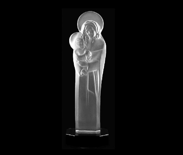 LALIQUE MOLDED AND FROSTED "MADONNA WITH JESUS": French. Signed Lalique France. Catalog No. 12014. Mounted on a black glass base. Height 14 3/8". (600/800)