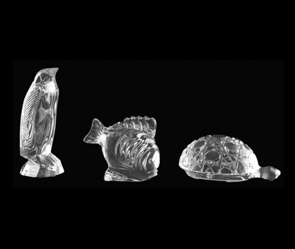 GROUP OF THREE WATERFORD CRYSTAL ANIMALS: Irish. Acid stamped. Comprising: turtle, penguin and a fish. (100/150)