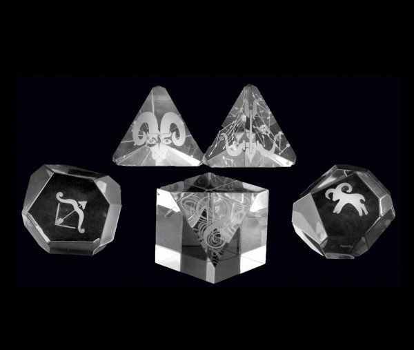 GROUP OF FIVE ETCHED CRYSTAL ZODIAC CUBES: Comprising: three by Steuben (Cond: chips) and two by Spode. (100/150)