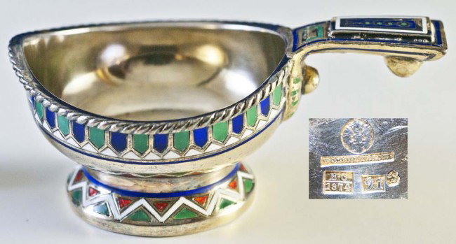 RUSSIAN SILVER AND CHAMPLEVE ENAMEL KOVSH: Moscow. Dated 1874. (91 Standard) Assayer: Viktor Savinkov. Maker: P. Ovchinnikov and stamped with the imperial warrant. Length 3 1/8". (Cond: minor loss to enamel on handle) (300/400)