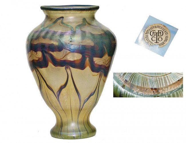 TIFFANY STUDIOS FAVRILLE GLASS VASE: American. Late 19th Century. Signed Louis C. Tiffany, No. D 1194 and with original paper label. With feather design. Height 13 3/4". (5000/7000)