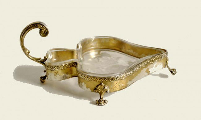 GILT STERLING SILVER AND ETCHED GLASS CANDY DISH: American. 1876-1929. Maker: Black, Starr & Frost. Of leaf shape with upright scroll handle. Length 7 1/4". (4 oz) (100/150)